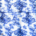 Load image into Gallery viewer, Southlake Paws Jeffers Expression Oversized Fleece Throw Blanket features a blue and white scenic pattern with trees and hors
