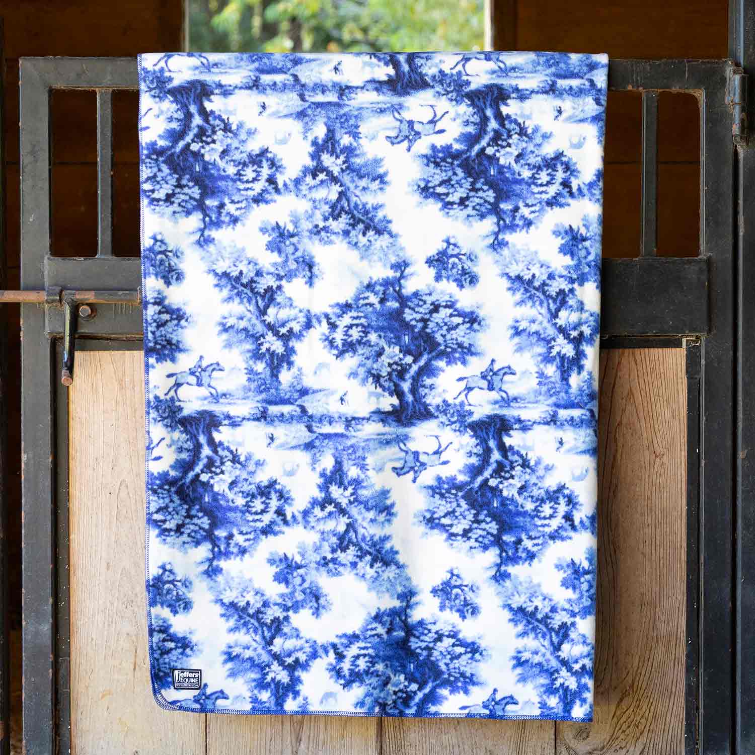 Oversized fleece throw blanket by Southlake Paws, featuring a blue and white tree pattern, measuring 60" x 84".