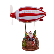 Kurt Adler 8-Inch Battery Operated Musical Santa Hot Air Balloon Table Piece With Digital Propeller