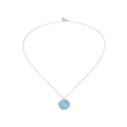 Sterling silver necklace with coin and light blue enamel
