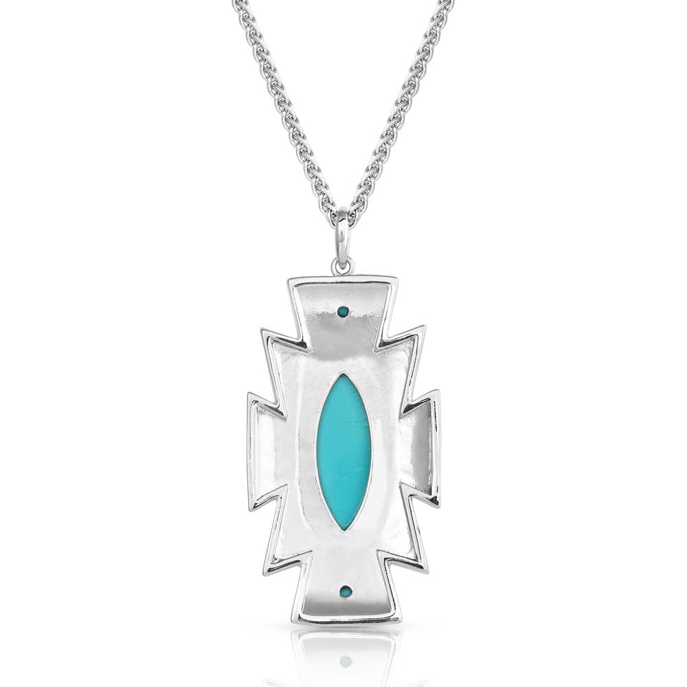 Turquoise pendant necklace with silver accents, featuring a geometric design and a chain. Ocean Storm Cloud by Southlake Paws