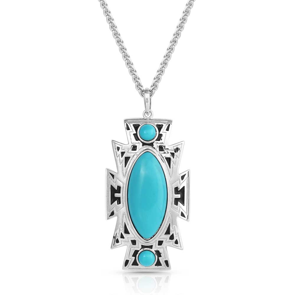 Turquoise necklace from Southlake Paws featuring a large oval stone and intricate silver design on a chain.