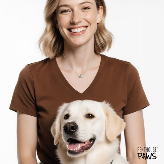 Silver chain necklace featuring a dog love pendant, worn by a smiling woman with a golden retriever.
