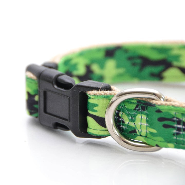EcoBark Camo Bow Tie Dog Collar featuring a camouflage print in green and black, with a black buckle and silver D-ring.