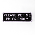 Load image into Gallery viewer, Black rectangular patch with white text reading "PLEASE PET ME I'M FRIENDLY" from Southlake Paws.
