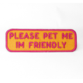 Load image into Gallery viewer, Southlake Paws Please Pet Me Patch features a bright orange background with pink embroidered text stating "PLEASE PET ME I'M 
