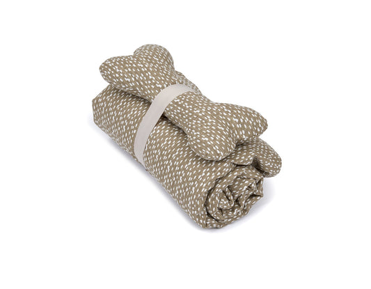 Southlake Paws Blanket and Bone Toy Set in Dottie Tan, featuring a rolled blanket and a matching bone toy.