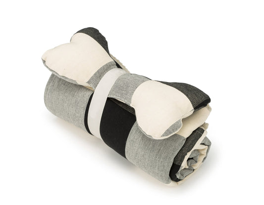 Southlake Paws Buffalo Black Blanket and Toy Bone, featuring a rolled blanket with a bone-shaped design in black and gray.