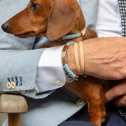Personalized silver and leather dog tag with blue details