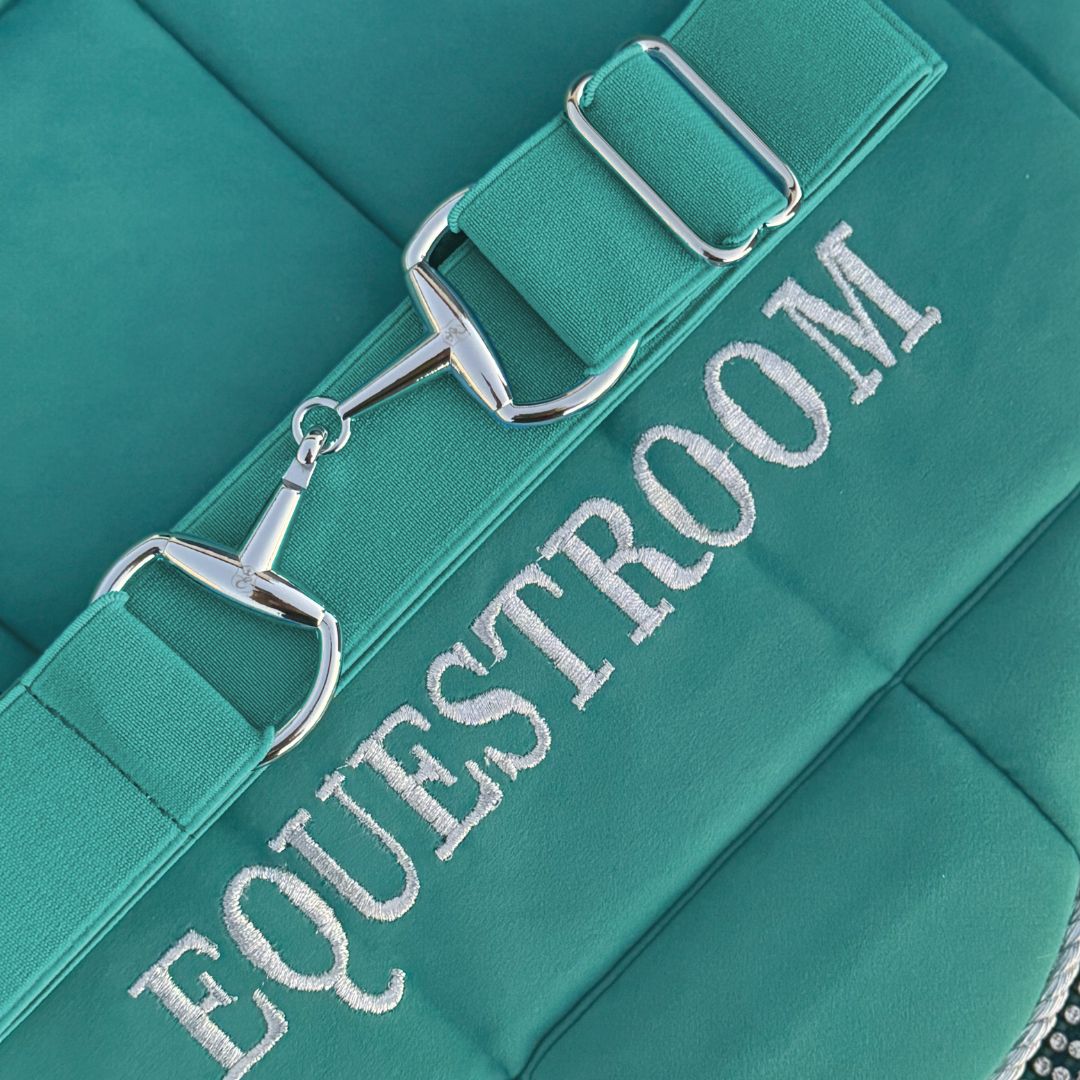 Teal elastic equestrian belt by Southlake Paws featuring silver hardware and embroidered "EQUESTRIAN" text.